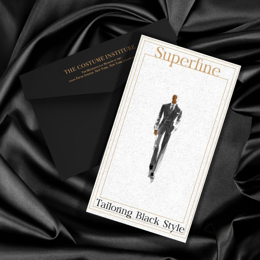 Elegant black and gold event invitation featuring a tailored suit illustration with luxury typography and envelope on satin fabric.