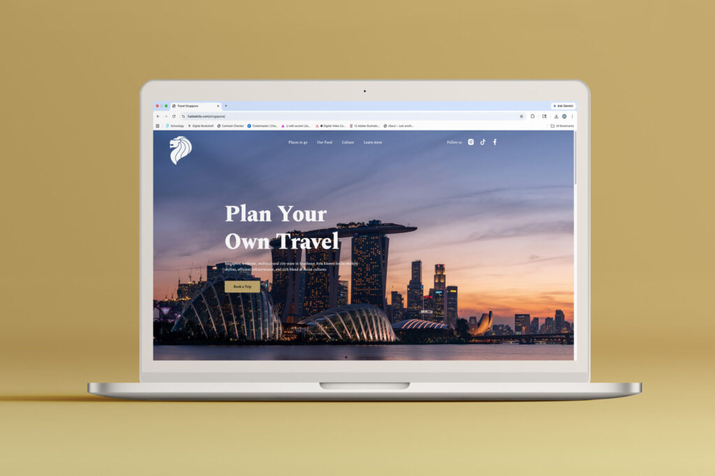 Travel website design displayed on a laptop screen featuring a city skyline and clean layout